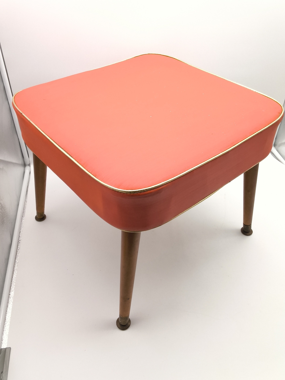 Vintage Mid Century Modern Coral Vinyl Ottoman Footstool With Tapered Legs